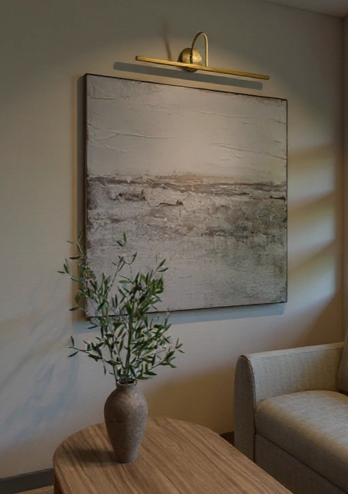 Zbliżenie na obraz i teksturę ściany w salonie, profesjonalna aranżacja wnętrz Cieszyn.